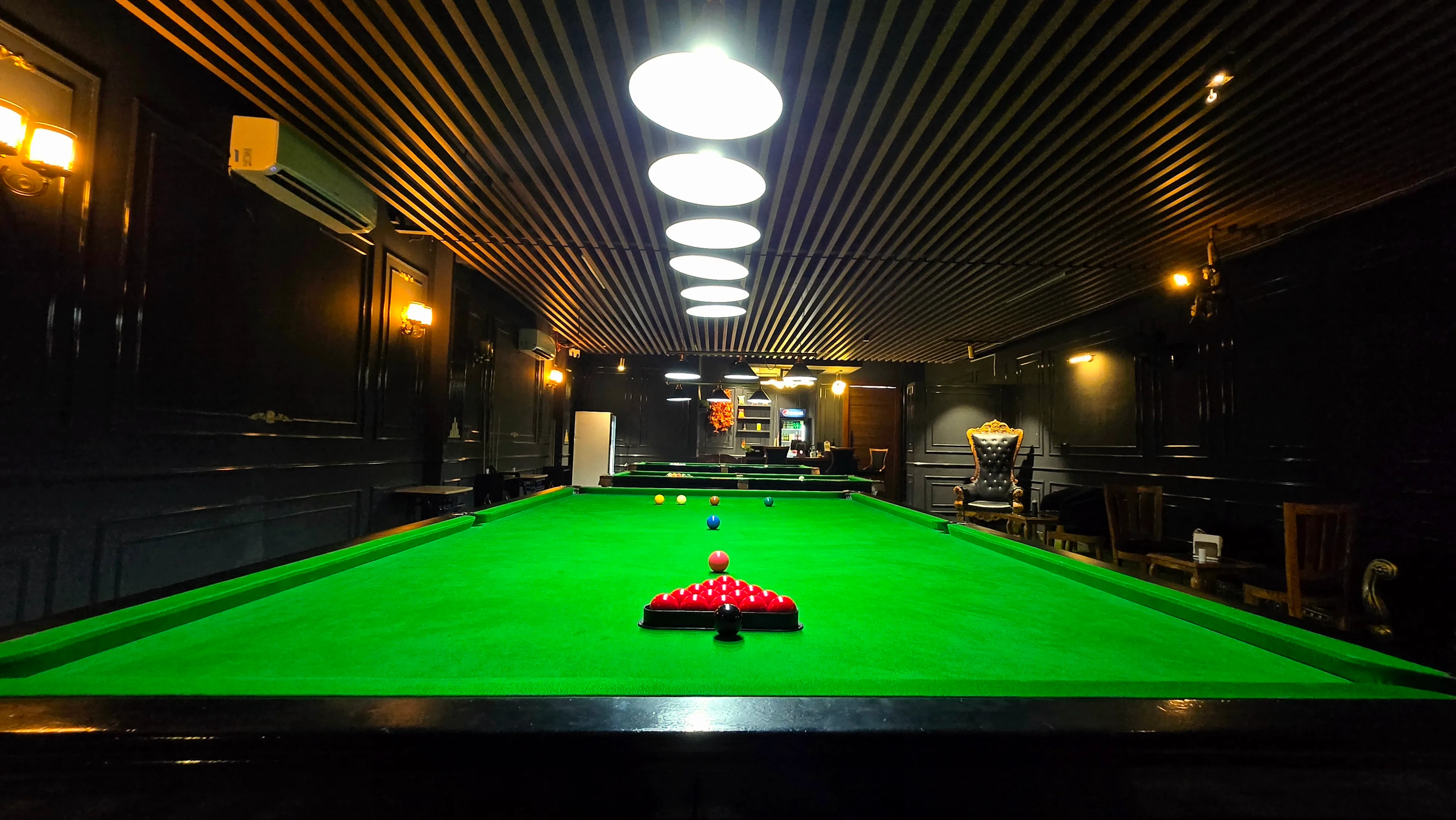 Snooker table under pendant lights at Pour Gourmet